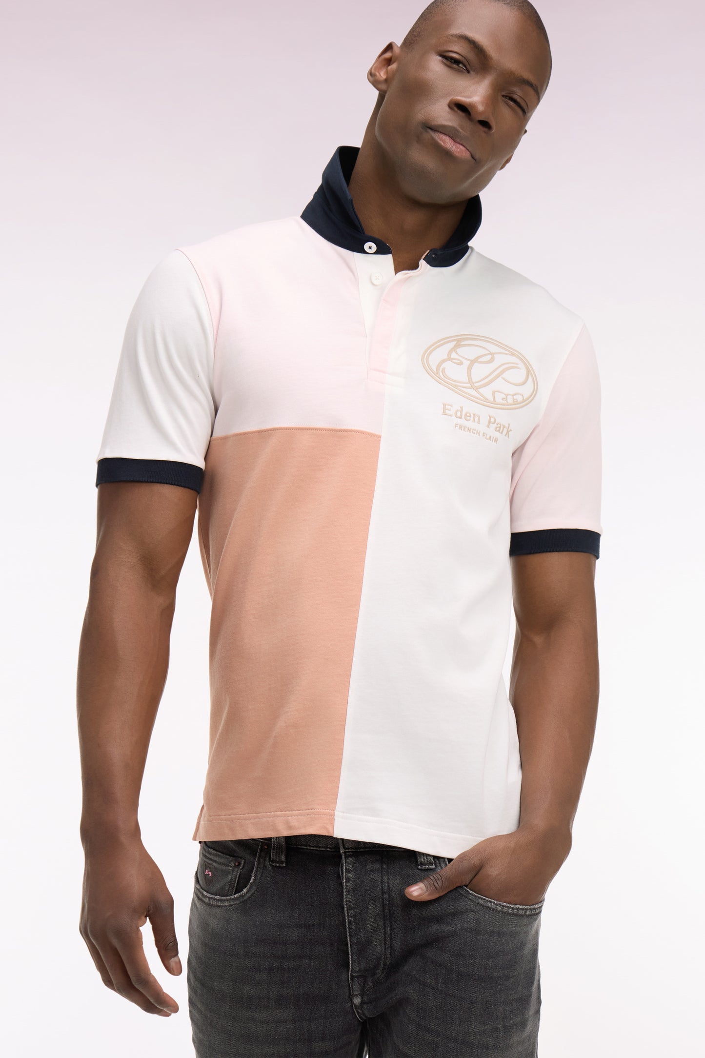Pink short-sleeved jersey with graphic cutouts and regular-fit embroidery