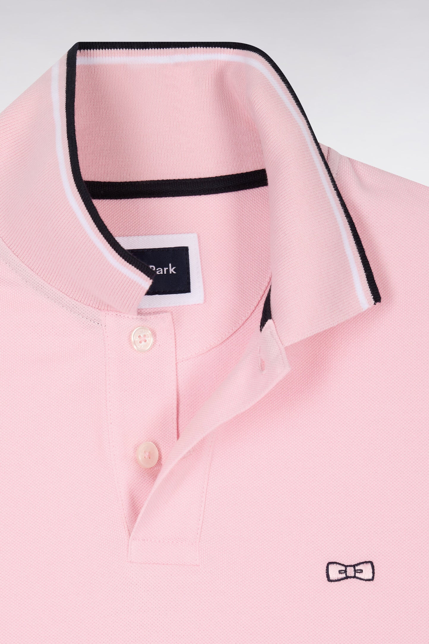 Polo à manches courtes en coton rose détails rayés coupe regular