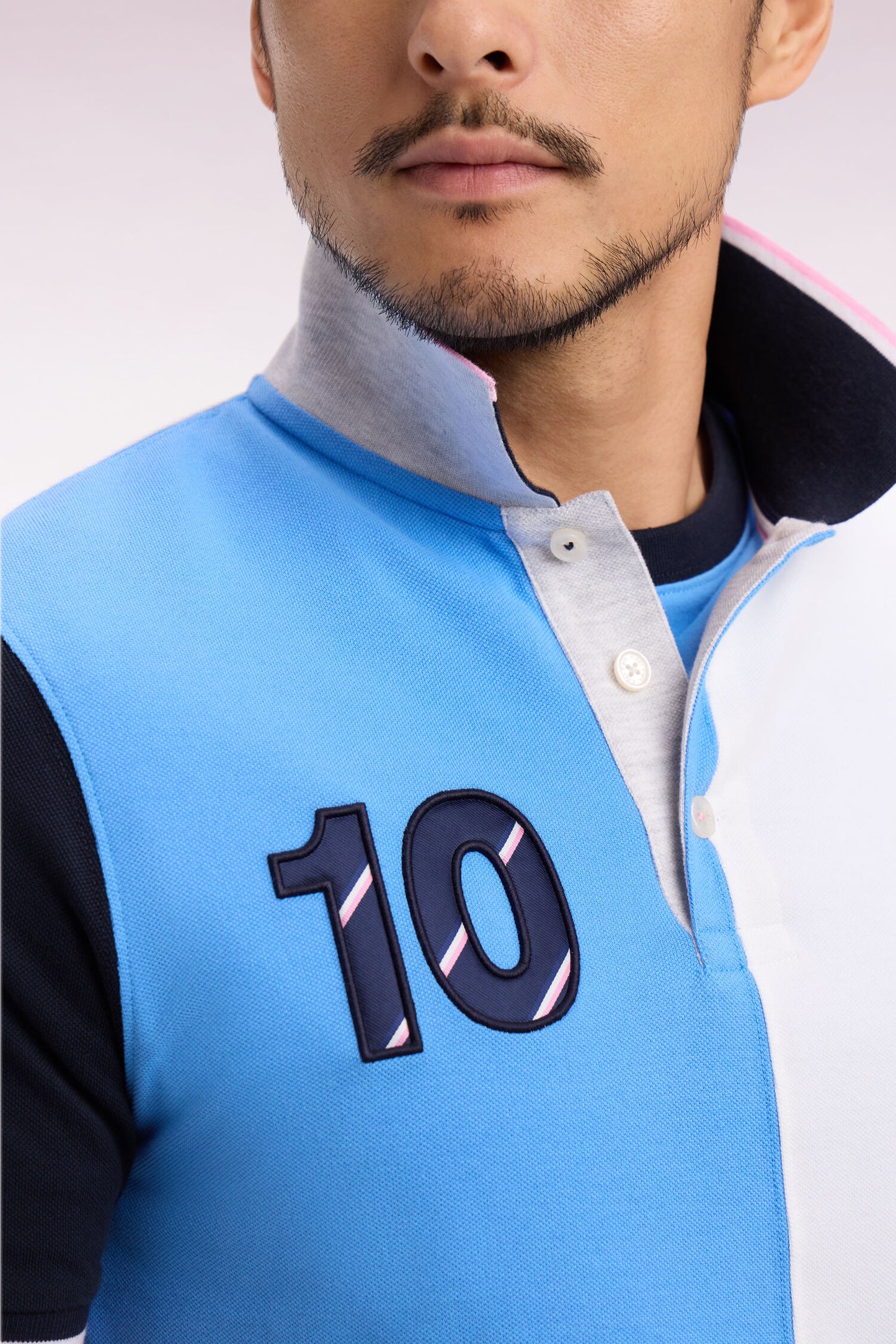 XV de France short-sleeved polo shirt in blue cotton with vertical cutouts