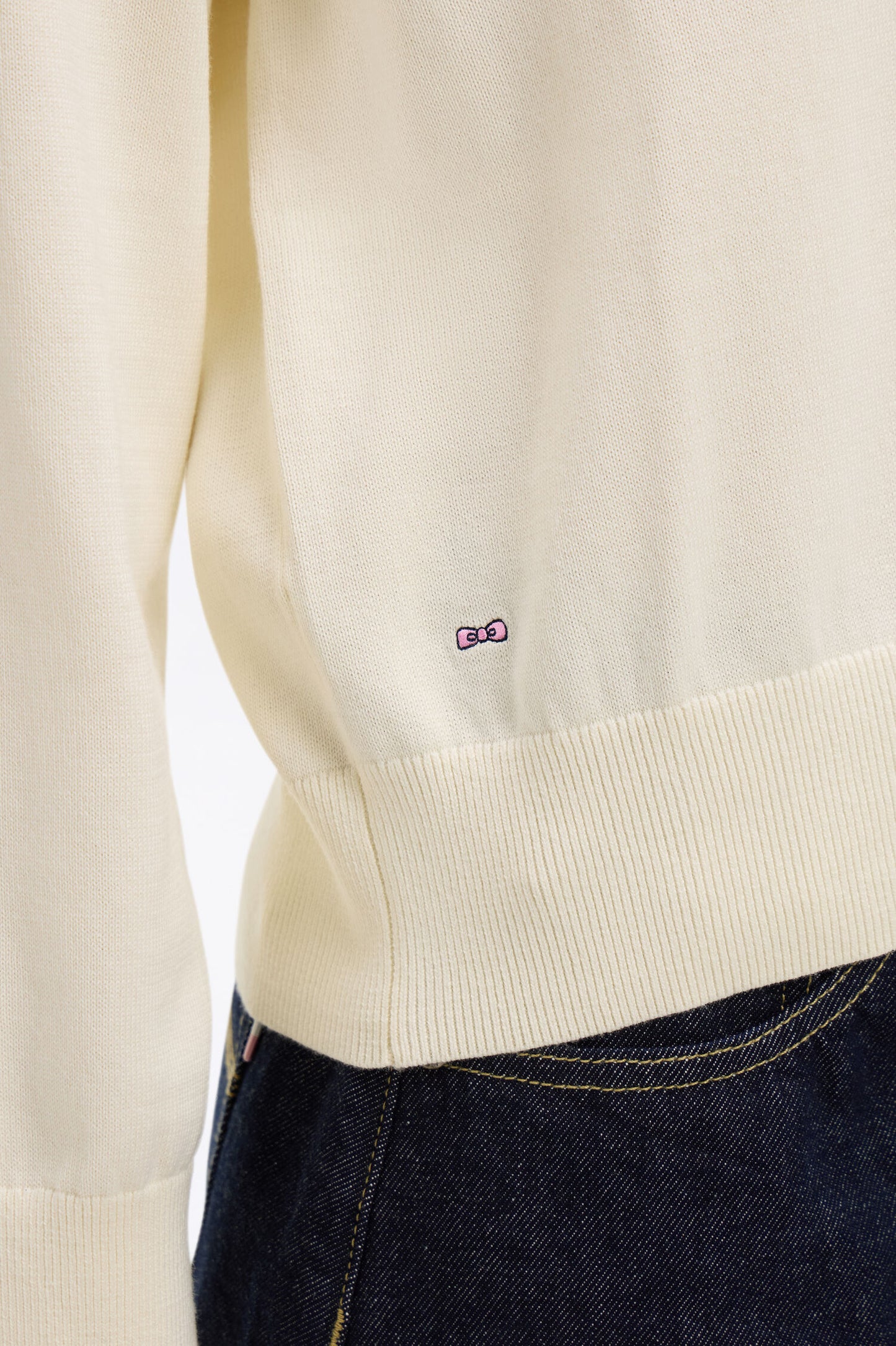 Oversized cut ecru cotton V-neck sweater