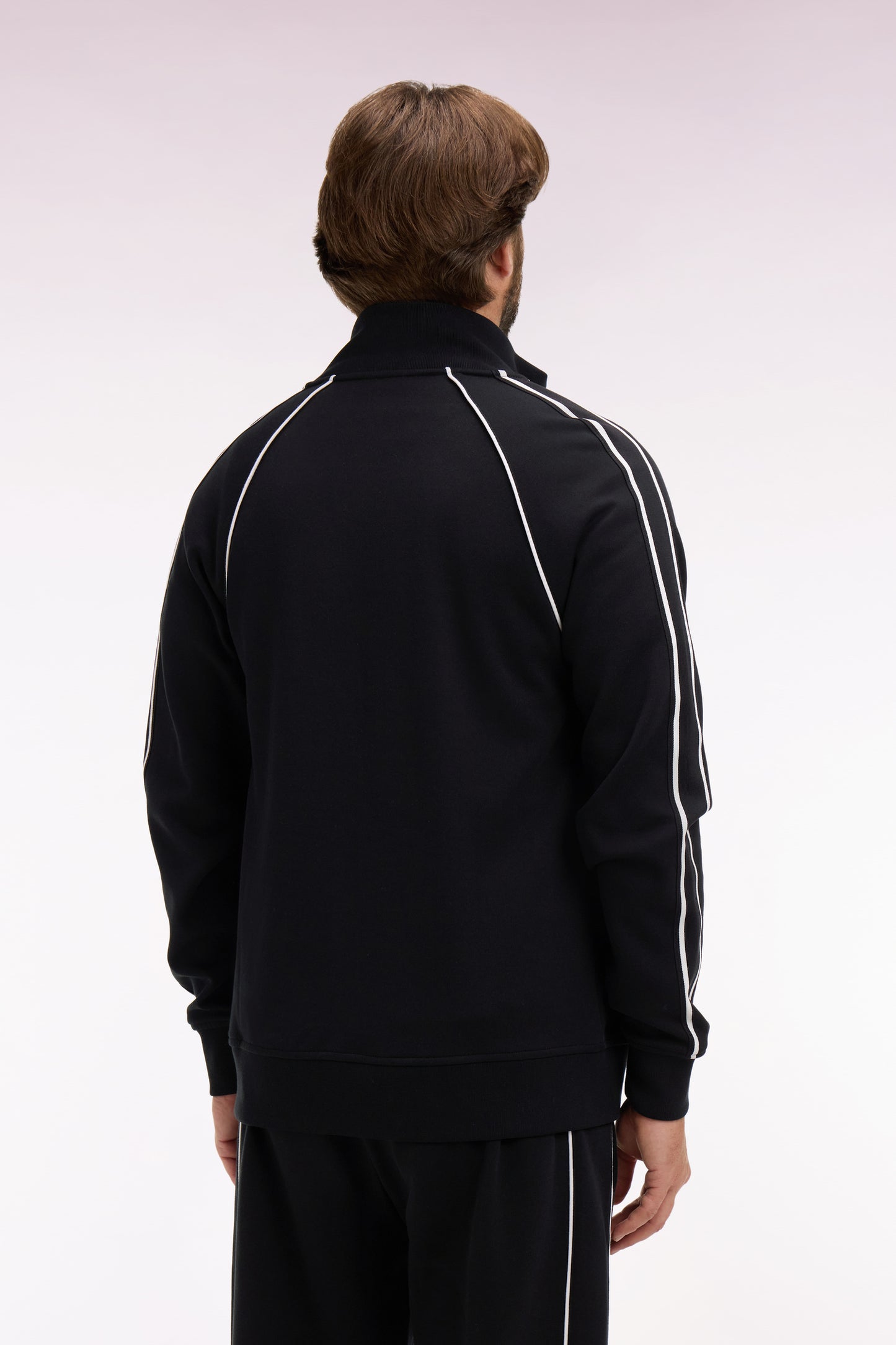 Sweatshirt zippé en interlock noir découpes ruban coupe regular