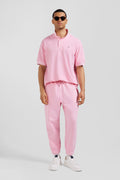 Jogging unisexe en molleton coton rose surteint coupe Relaxed