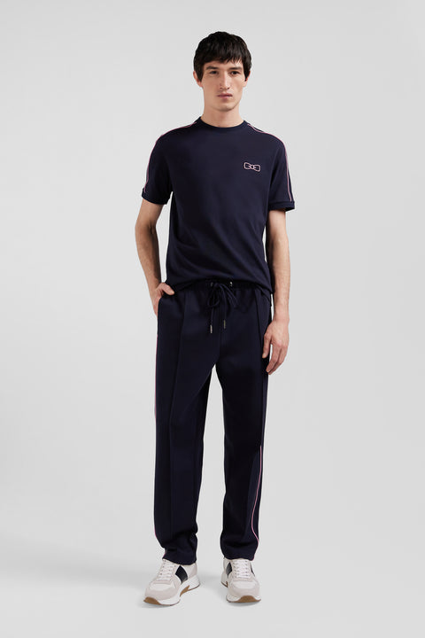 Regular navy blue mixed cotton jogging bottoms with pink piping - Image 1