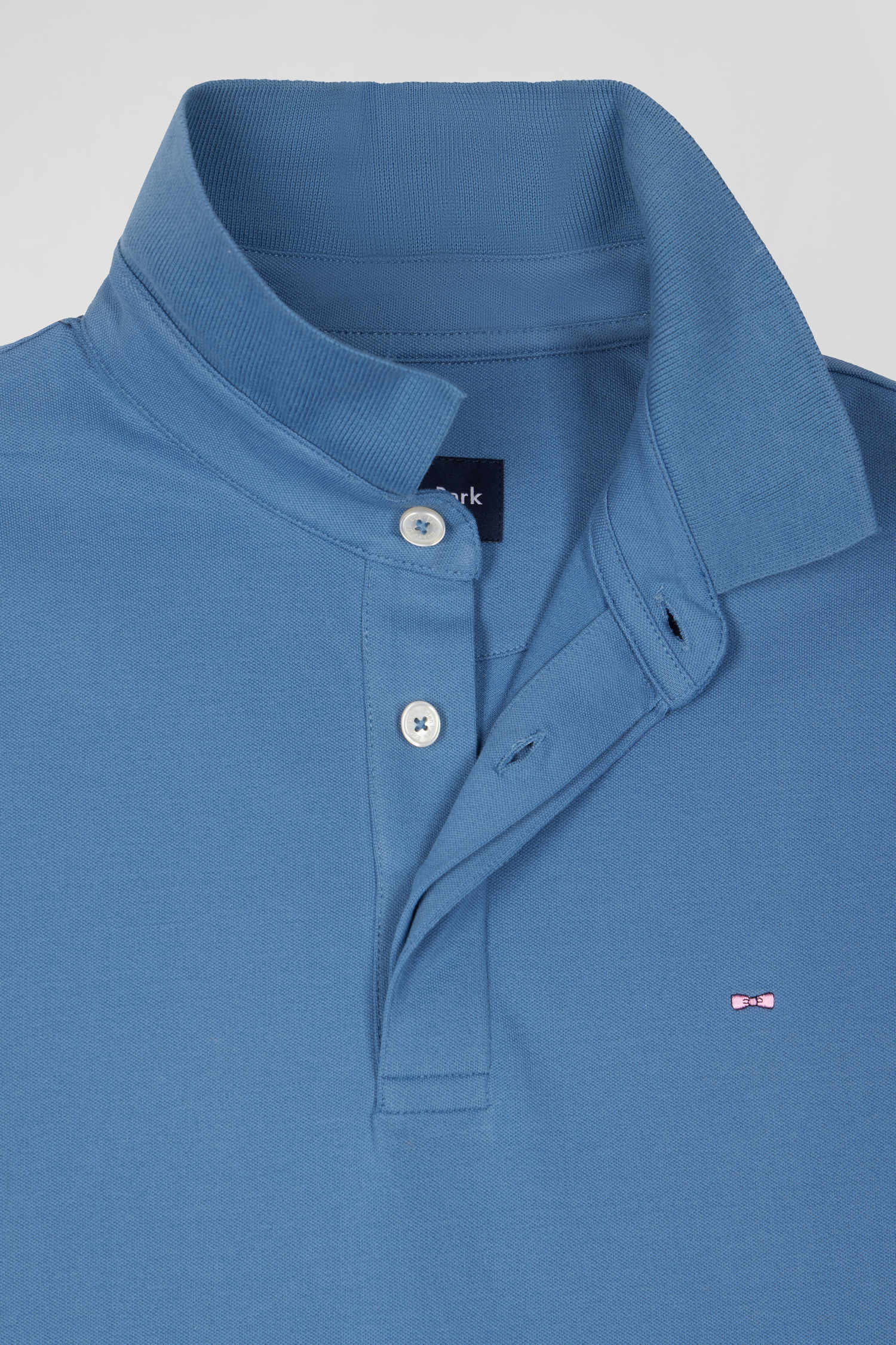 Polo manches courtes en coton stretch bleu coupe Slim