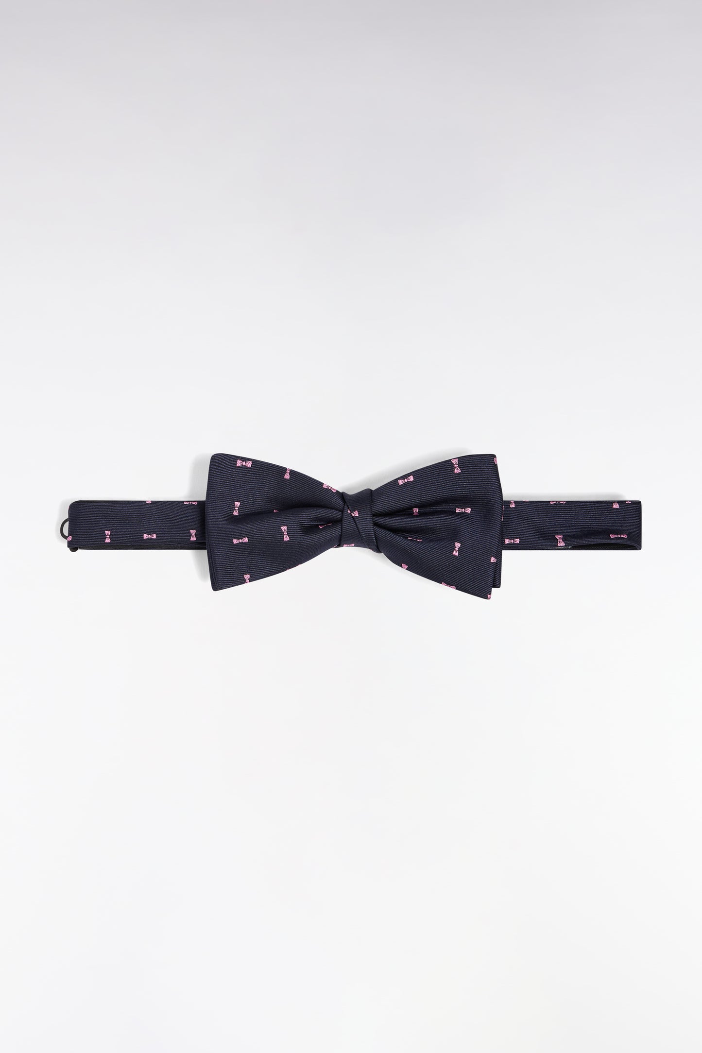 Bow tie in navy silk with micro-patterned pink bow ties