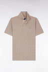 Polo manches courtes en coton chiné beige coupe droite