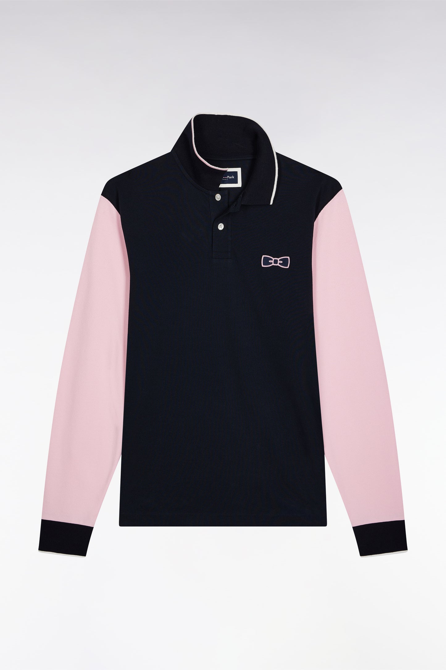Two-tone navy and pink long-sleeved polo with bow tie