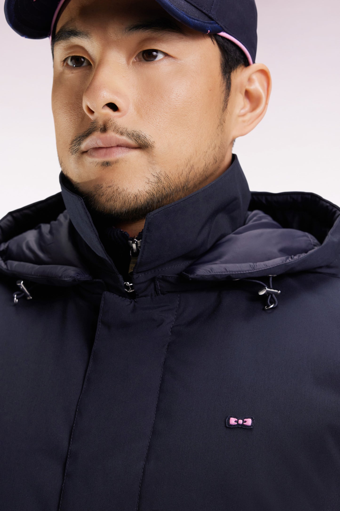 Long navy nylon raincoat with removable hood