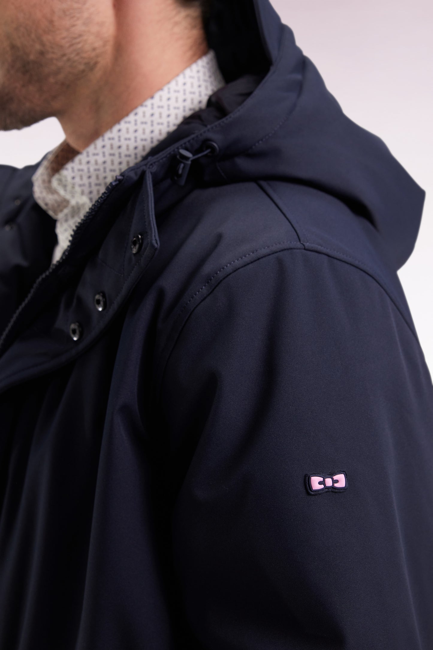 Long navy nylon parka with integrated hood