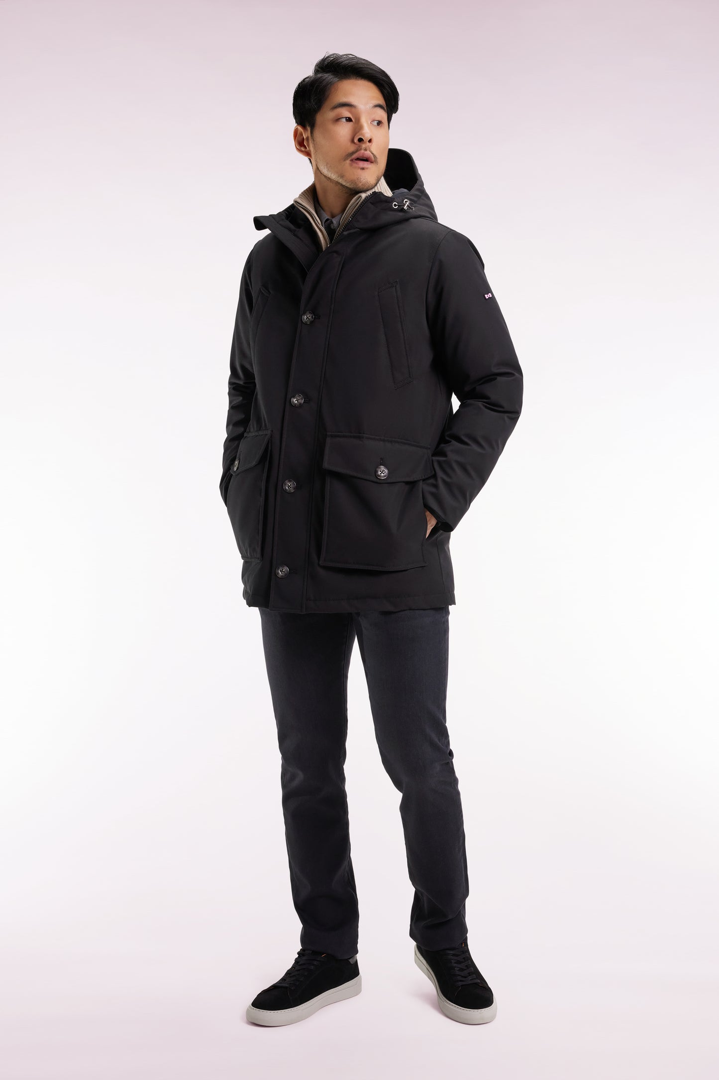 Short parka in black nylon with patch pockets