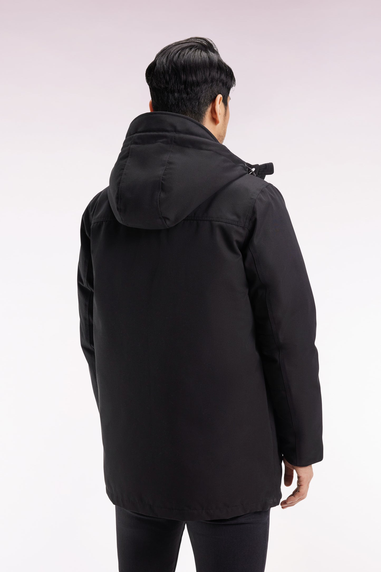 Short parka in black nylon with patch pockets