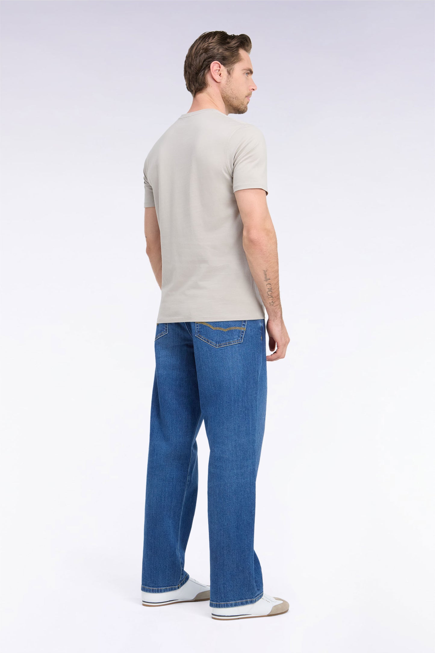 Jean en denim stretch bleu stone bleach coupe regular