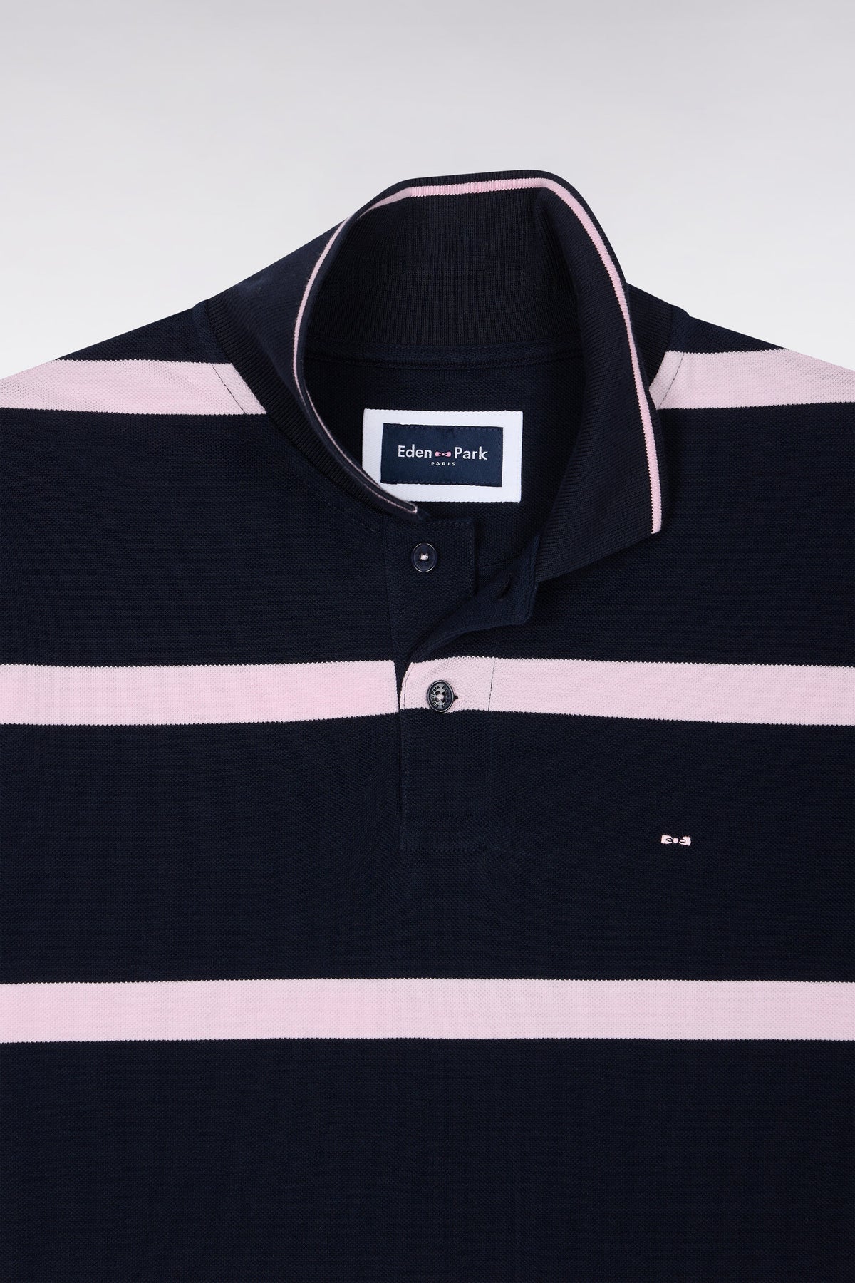 Short-sleeved navy polo shirt with pink stripes, straight cut