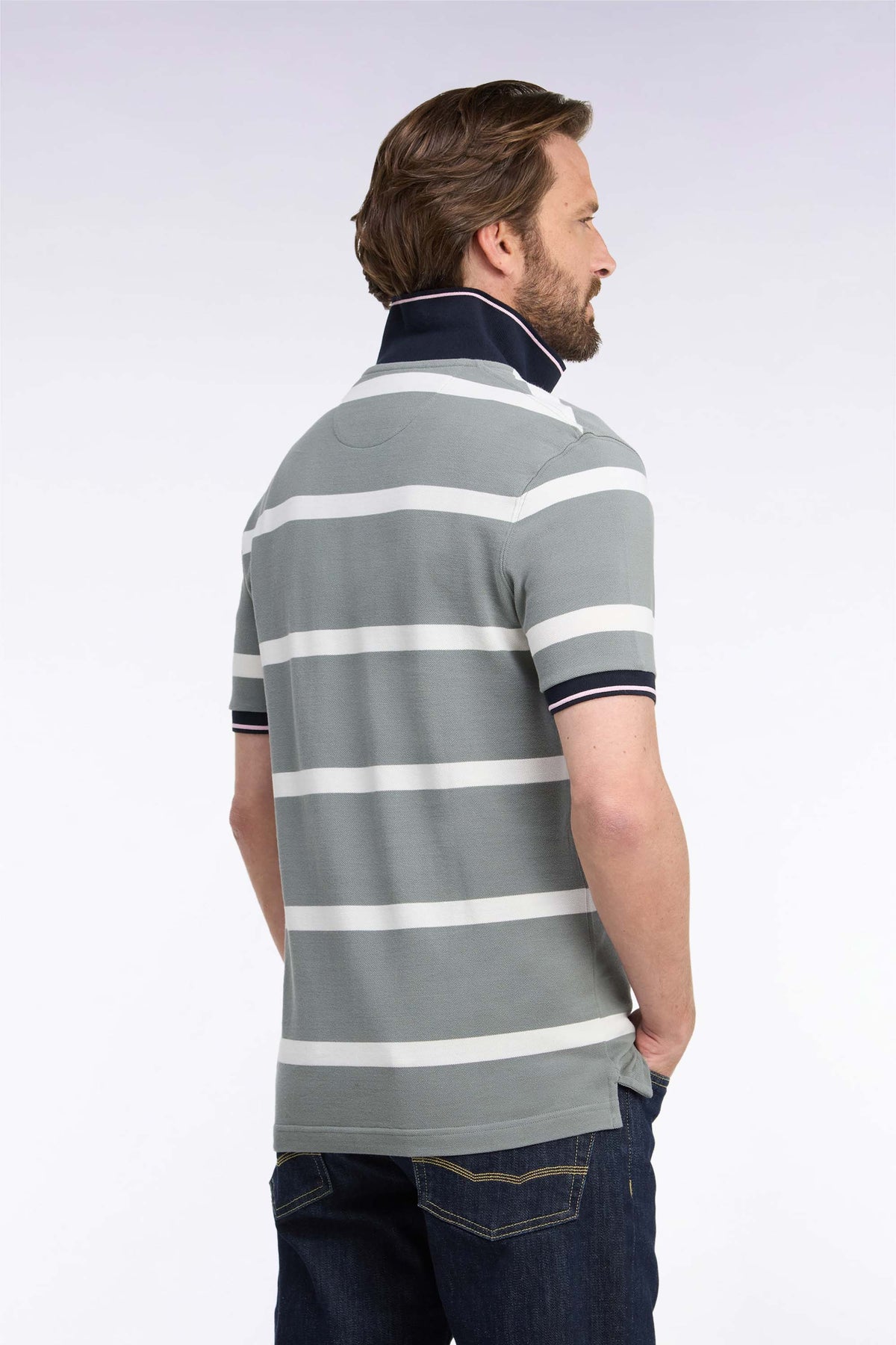 Green short-sleeved polo shirt with ecru stripes, straight cut
