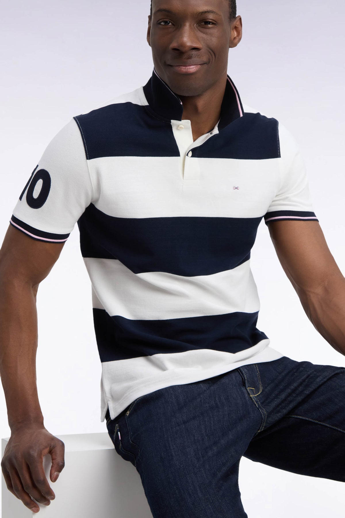 Short-sleeved polo shirt with ecru and navy rugby stripes, straight cut