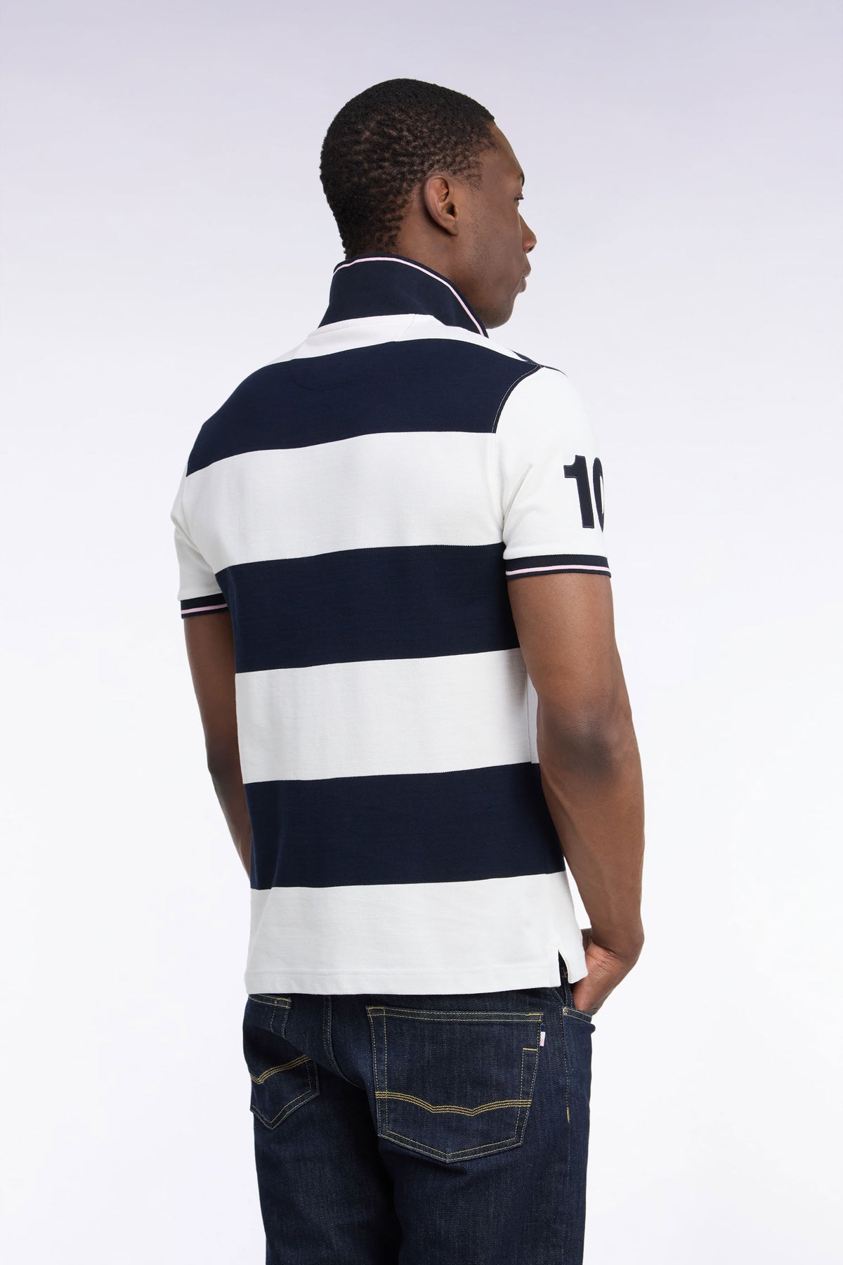Short-sleeved polo shirt with ecru and navy rugby stripes, straight cut