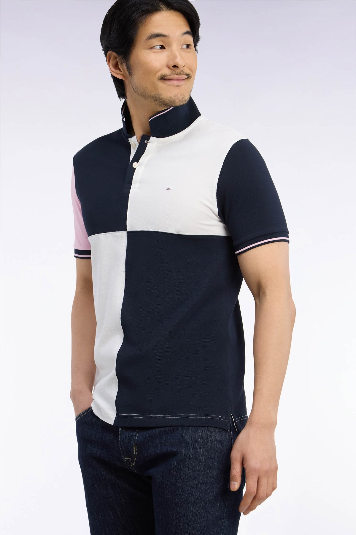Polo manches courtes en piqué de coton tricolore à découpes écru coupe droite