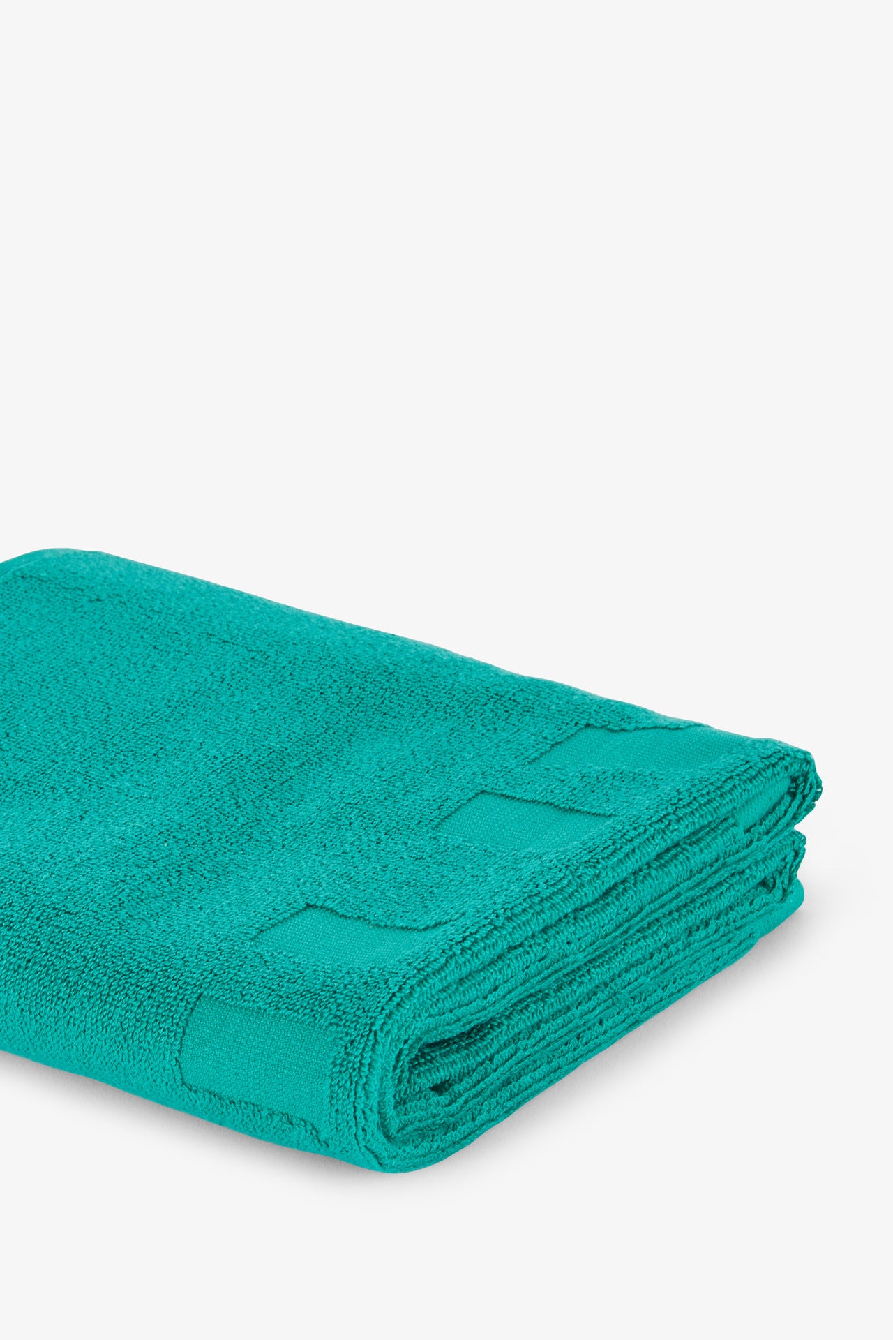 Small green sports towel