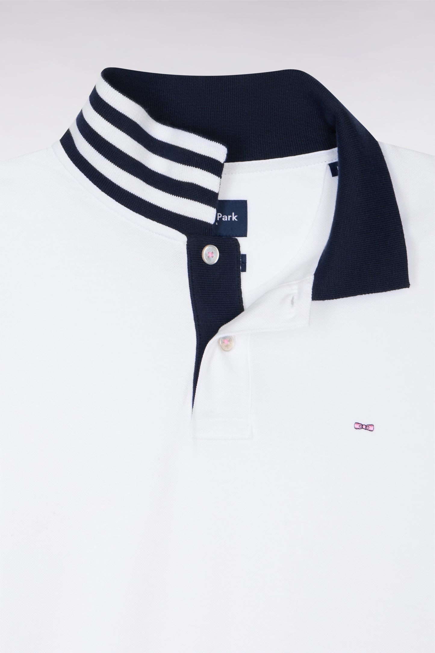 White pima cotton polo with contrasting accents