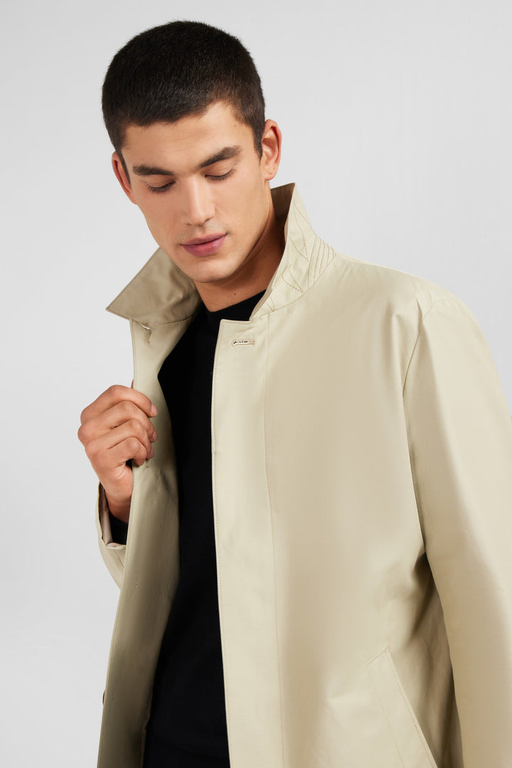 Plain beige raincoat