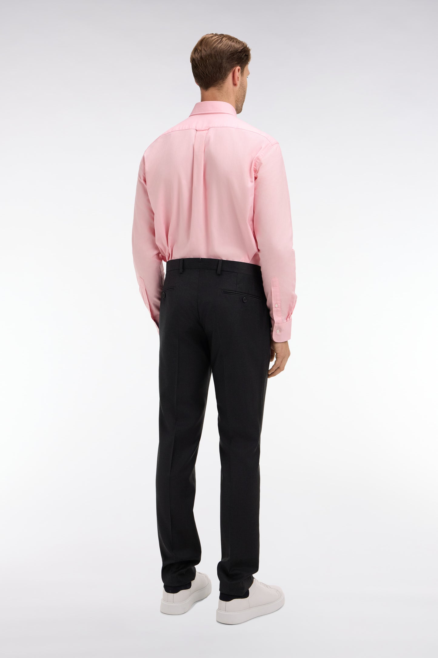 Slim dark grey wool trousers with broken fold