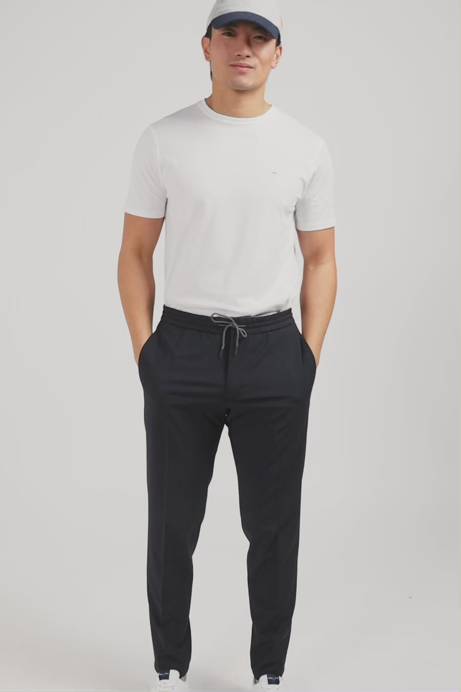 Navy blue trousers with elasticated waist