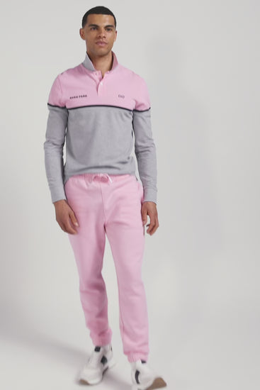 Polo manches longues bicolore en piqué coton rose coupe Regular