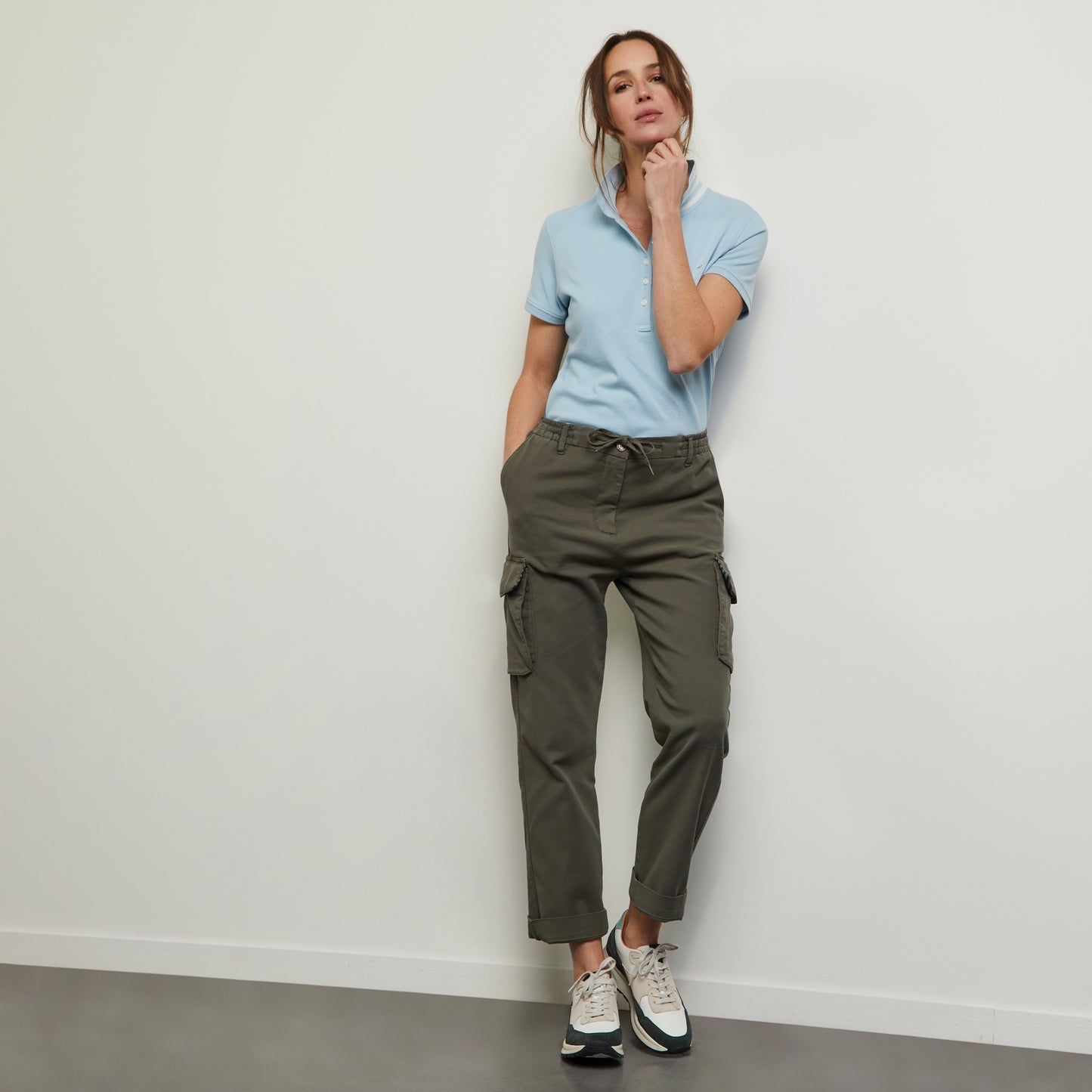 Light blue polo in Pima cotton pique, with striped collar