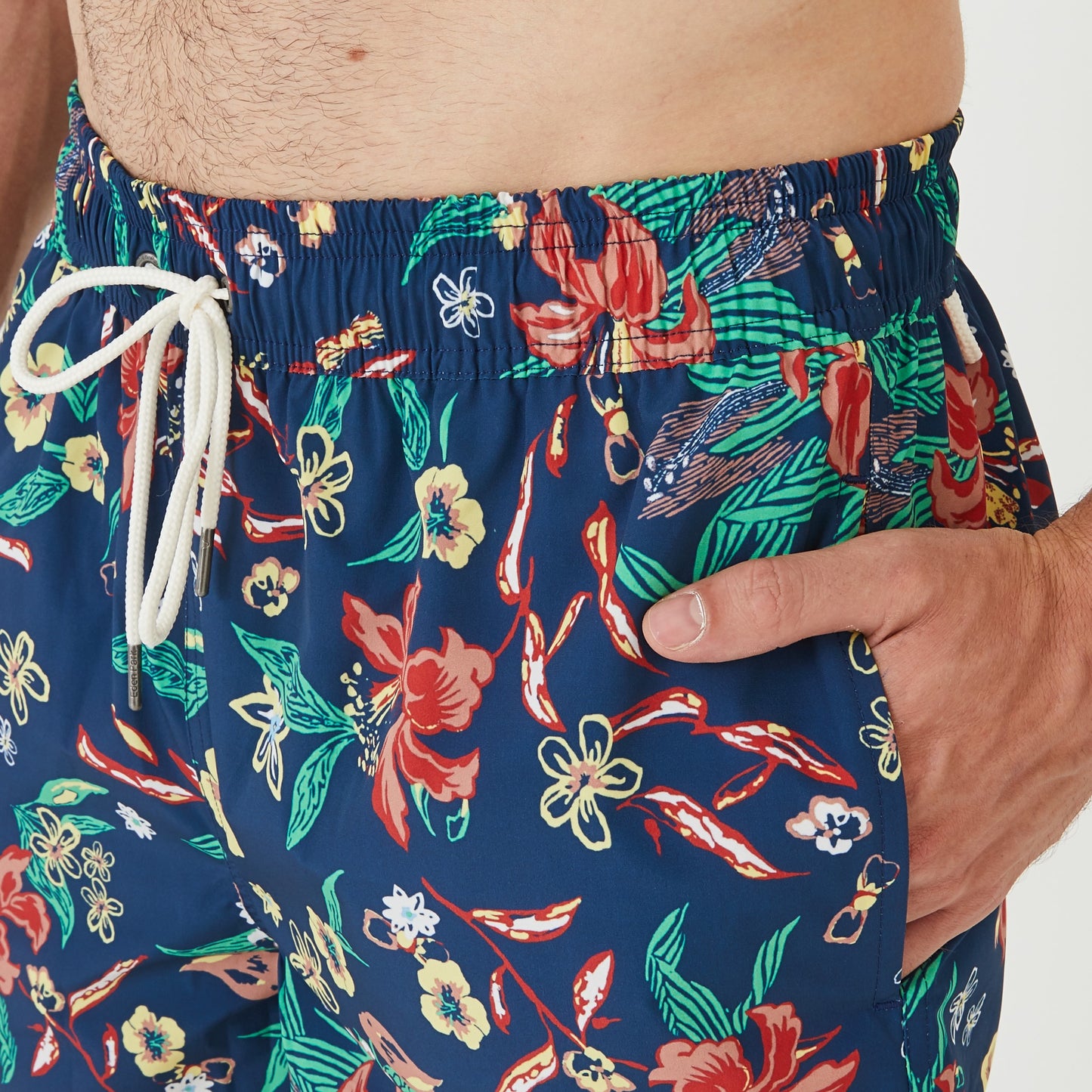 Navy blue swim shorts with floral pattern