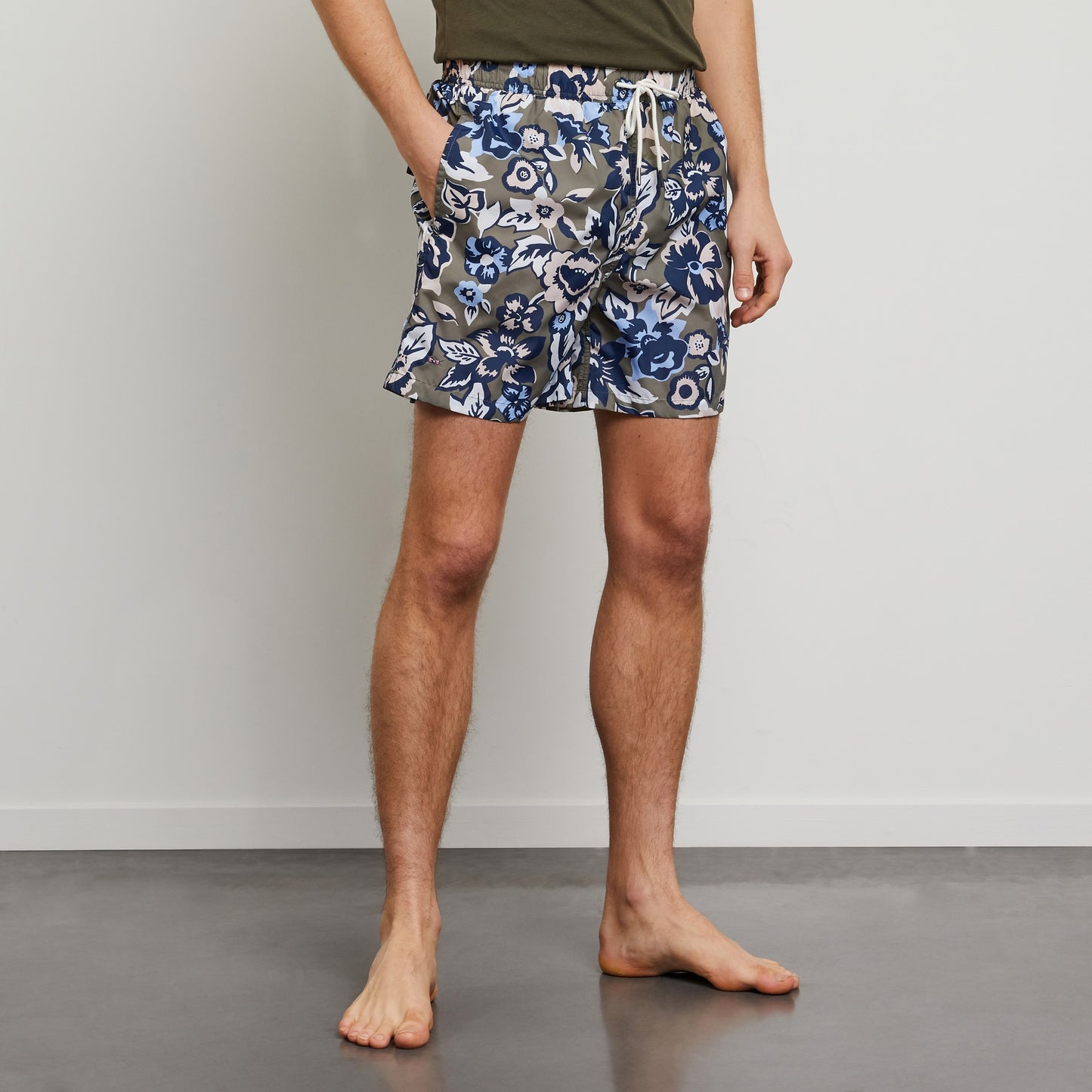 White swim shorts with exclusive floral print