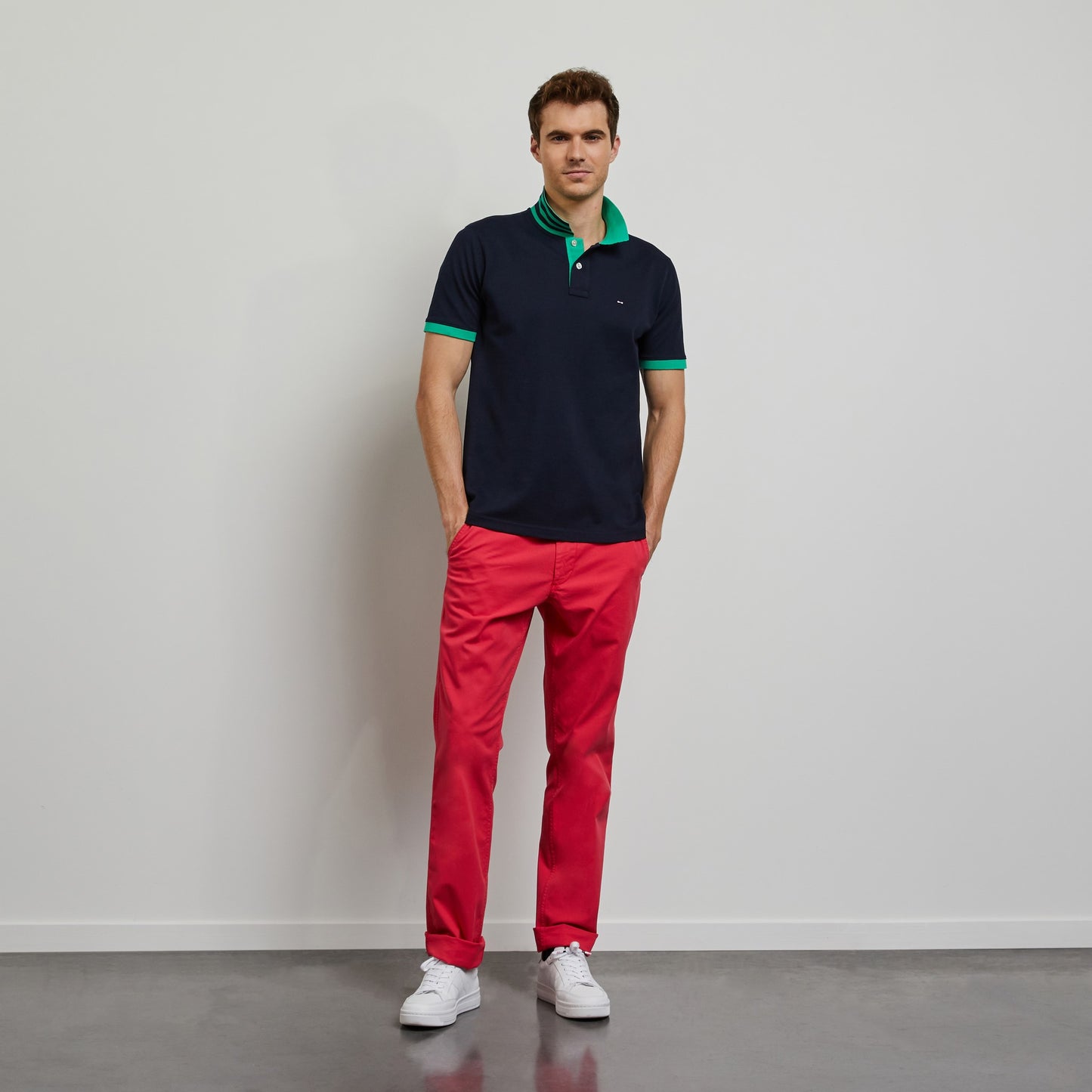 Dark blue polo with green trims, in Pima cotton