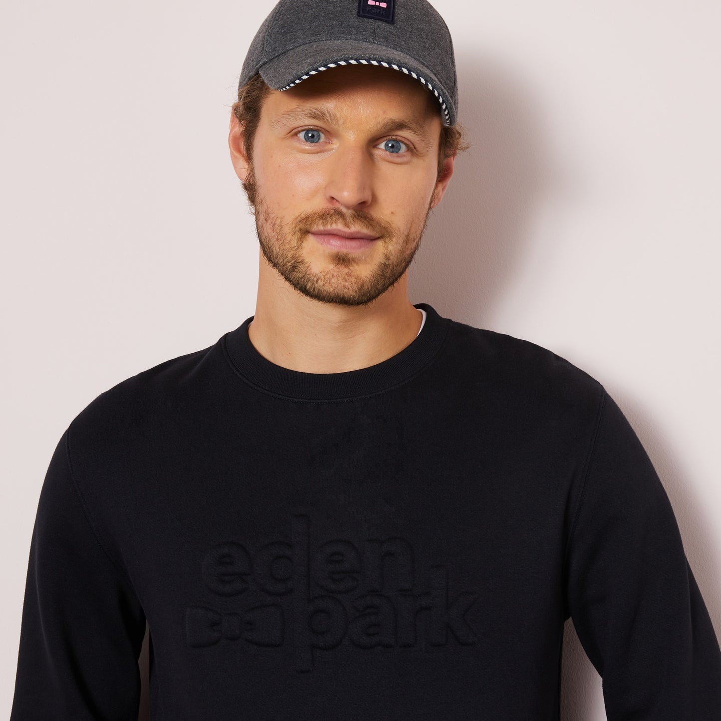 Black sweatshirt with embossed logo